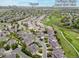 Aerial view of the neighborhood with Heritage Eagle Bend Golf Course and E-470 close by at 22342 E Plymouth Cir, Aurora, CO 80016