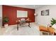 Bright home office featuring modern decor, work space, plants, and a comfortable lounge area at 22342 E Plymouth Cir, Aurora, CO 80016