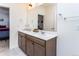 Bathroom featuring double sink vanity, quartz countertops, and modern fixtures at 2149 Indian Balsam Dr, Monument, CO 80132