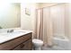 Bathroom with a tub and shower featuring white tile surround, and modern fixtures at 2149 Indian Balsam Dr, Monument, CO 80132