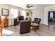 Cozy living room with wood floors, contemporary fireplace, and plenty of natural light at 2149 Indian Balsam Dr, Monument, CO 80132