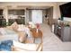 Basement featuring living area, kitchenette, sliding barn door, television, recessed lighting, and carpeted floors at 3910 Mighty Oaks St, Castle Rock, CO 80104