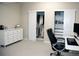 Bedroom featuring a closet, dresser, and desk setup at 3910 Mighty Oaks St, Castle Rock, CO 80104