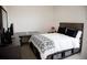 Nicely decorated bedroom with under bed storage, desk, and stylish furnishings at 3910 Mighty Oaks St, Castle Rock, CO 80104