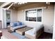 Relaxing outdoor deck with comfortable seating and stylish decor, perfect for enjoying the view at 3910 Mighty Oaks St, Castle Rock, CO 80104