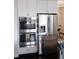 Modern kitchen with stainless steel appliances, double oven and french door refrigerator at 3910 Mighty Oaks St, Castle Rock, CO 80104