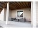 Inviting covered patio space with comfortable seating, perfect for outdoor entertainment and relaxation at 3910 Mighty Oaks St, Castle Rock, CO 80104