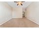 Large bedroom with carpet flooring, walk-in closet, and ample natural light at 9637 E 5Th Ave # 101, Denver, CO 80230