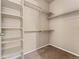 Walk-in closet featuring shelving for storage at 9637 E 5Th Ave # 101, Denver, CO 80230