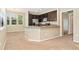 Modern kitchen with stainless steel appliances and seamless integration with living area at 9637 E 5Th Ave # 101, Denver, CO 80230