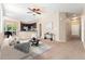 Spacious open-concept living area with modern kitchen and dining space at 9637 E 5Th Ave # 101, Denver, CO 80230