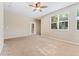 Bright and airy living room offering access to an outdoor patio or balcony at 9637 E 5Th Ave # 101, Denver, CO 80230