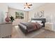 Bright bedroom with natural light, complemented by stylish furniture and décor at 9637 E 5Th Ave # 101, Denver, CO 80230