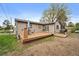 Back deck features outdoor seating and a grill, perfect for entertaining guests at 31 Circle Dr, Castle Rock, CO 80104