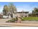 A well-maintained split-level home with lush lawn and landscaped front yard with rock features at 31 Circle Dr, Castle Rock, CO 80104