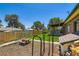 Backyard features a covered patio, privacy fence, and storage shed at 10684 Downing St, Northglenn, CO 80233