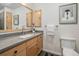 Modern bathroom with a spacious vanity, sleek fixtures, and neutral finishes throughout the space at 2308 Hearth Dr # 37, Evergreen, CO 80439