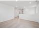 Spacious upper level bonus room with neutral carpet and plenty of natural light at 45940 Gentry Ave, Bennett, CO 80102