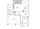 An open-concept floor plan features a gourmet kitchen, great room, study, and three car garage at 1696 Green Fern Pt, Castle Rock, CO 80104
