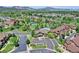 Beautiful aerial view of the neighborhood featuring a pond, green spaces, and well maintained homes at 5887 S Taft Ln, Littleton, CO 80127