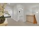 Second floor hallway with staircase and views into adjacent bedrooms at 5887 S Taft Ln, Littleton, CO 80127