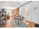 Bright dining room with hardwood floors and classic accents for elegant meals at 3042 N Franklin St, Denver, CO 80205