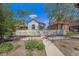 Charming home with a white picket fence and a well-maintained front yard at 3042 N Franklin St, Denver, CO 80205