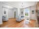 Spacious living room with hardwood floors, natural light, and comfortable seating at 3042 N Franklin St, Denver, CO 80205