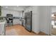 A bright and modern kitchen featuring stainless steel appliances and plenty of counterspace at 13438 W 23Rd Pl, Golden, CO 80401