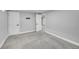 Open basement space with access to other rooms, ideal for a recreation or living area at 3200 Locust St, Denver, CO 80207