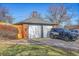 Two-car garage with ample parking space and additional parking on the driveway at 3200 Locust St, Denver, CO 80207