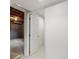 Unfinished basement with painted walls, concrete floor, and exposed ceiling at 2433 S Oneida St, Denver, CO 80224