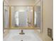 Close up view of a bathroom vanity with mirror and sink at 2433 S Oneida St, Denver, CO 80224