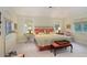Inviting bedroom with plush carpet, dual windows, and a comfortable seating area, creating a cozy retreat at 445 Madison N St, Denver, CO 80206