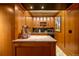 Concession stand features granite counters, a popcorn machine, and wood cabinetry at 445 Madison N St, Denver, CO 80206