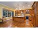 Spacious kitchen features custom wood cabinets, granite countertops, hardwood floors and stainless steel appliances at 445 Madison N St, Denver, CO 80206