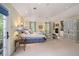 Spacious main bedroom features a fireplace, sitting area, french doors and custom built-ins at 445 Madison N St, Denver, CO 80206