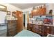 Bedroom featuring built-in storage and vintage furnishings at 6933 W 52Nd Pl, Arvada, CO 80002