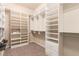 Large walk-in closet with custom shelving and storage solutions at 15122 Uinta St, Thornton, CO 80602