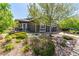 Beautiful home with a two-car garage, stone accents, lush landscaping, and inviting curb appeal at 15122 Uinta St, Thornton, CO 80602