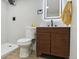 Modern bathroom with a sleek vanity, illuminated mirror, and a walk-in shower at 6991 S Lee Way, Littleton, CO 80127