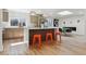 Modern kitchen with hardwood floors and a kitchen island at 6991 S Lee Way, Littleton, CO 80127