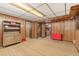 Spacious basement with paneled walls and built in cabinet at 10596 Ura Ln, Northglenn, CO 80234