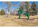 A view of Sperry Park's welcome sign in a neighborhood park setting at 10596 Ura Ln, Northglenn, CO 80234