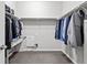Spacious walk-in closet with ample storage, custom shelving, and hanging racks, perfect for organizing clothes at 55 S Edge Cliff St, Castle Rock, CO 80104
