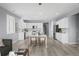 Open-concept living space featuring modern appliances, a large island, and lots of natural light at 55 S Edge Cliff St, Castle Rock, CO 80104