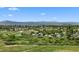 Scenic view of the community with lush green spaces and mountain views, perfect for nature lovers at 55 S Edge Cliff St, Castle Rock, CO 80104