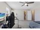 Bedroom with a ceiling fan and desk, providing a tranquil atmosphere for sleep or work at 1655 S Quintero Way, Aurora, CO 80017