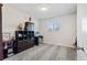 Bedroom with a desk, window, and modern shelving at 1655 S Quintero Way, Aurora, CO 80017