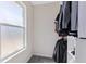 Walk-in closet with a frosted window offering natural light at 1655 S Quintero Way, Aurora, CO 80017